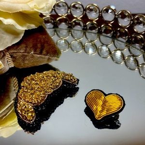 Handmade gold color croissant and heart shape brooches.